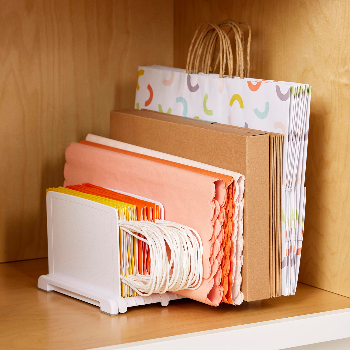 YouCopia StoraBag built-in handles allow carrying everything at once.
