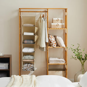 YOUDENOVA beige closet organizer side view showing durable frame and accessible pockets