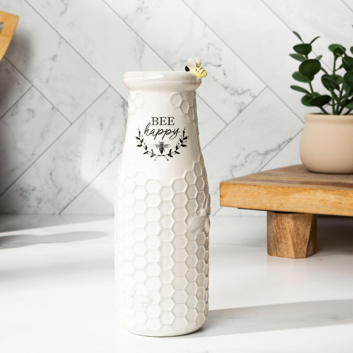Young's Inc Care-friendly ceramic vase easy to wipe and display.