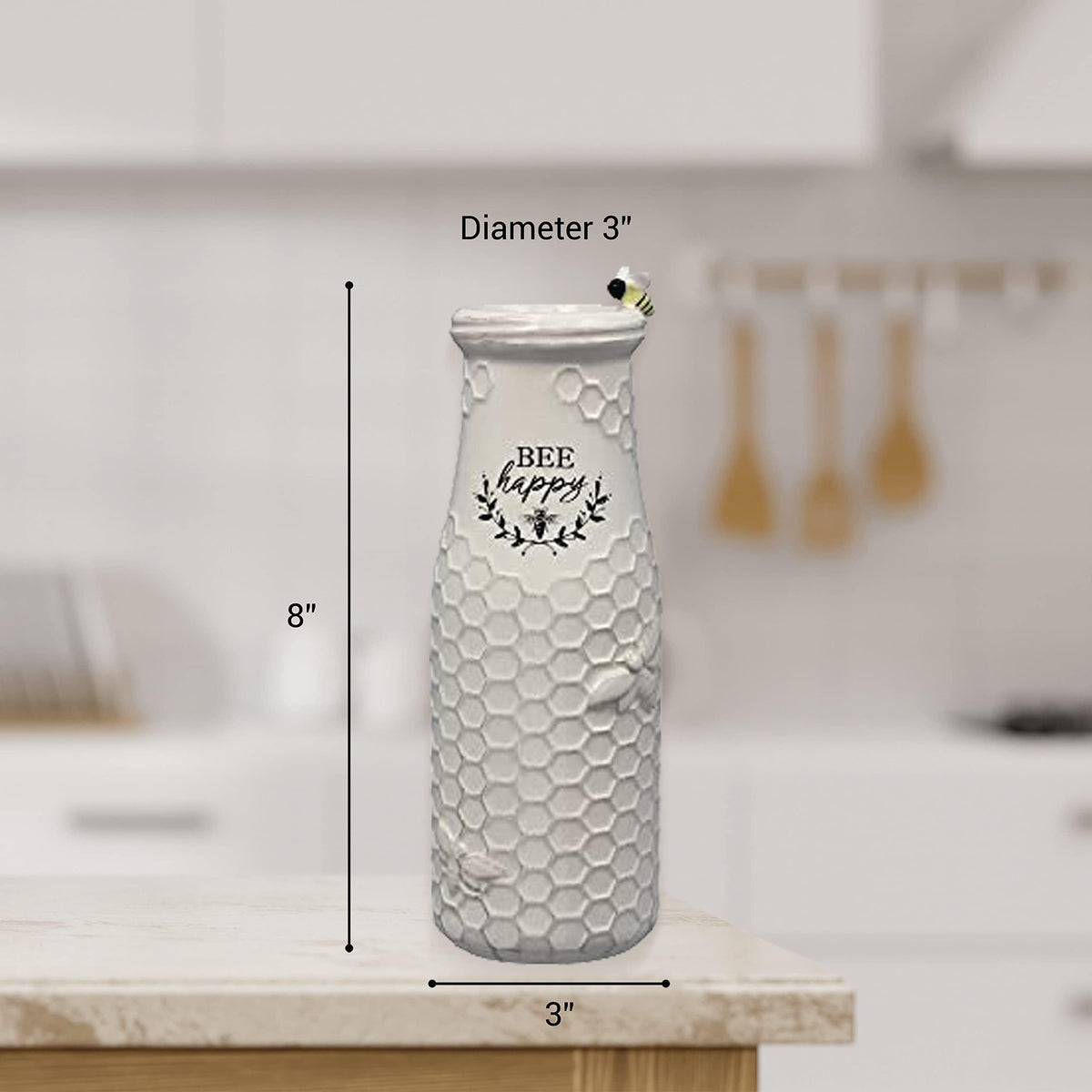 Young's Inc Vase with flowers display on table creates spring-inspired charm.