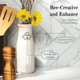 Young's Inc White ceramic vase detail emphasizes clean lines for versatile decor.