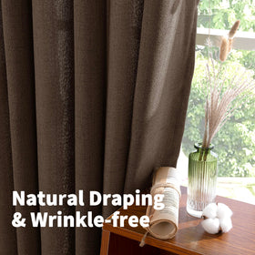 YoungsTex curtains with bronze grommets shown hung on a rod.