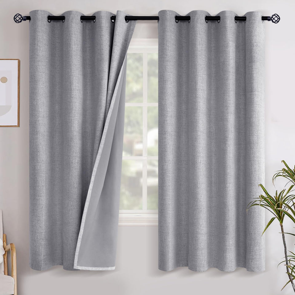 YoungsTex grey linen blackout curtains panel with grommets blocks light for privacy.