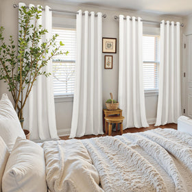 YoungsTex curtains close-up shows silver grommets for smooth sliding.