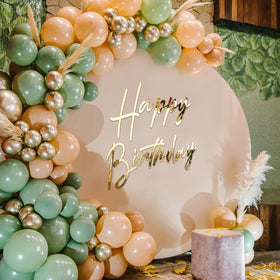 Yousoontic backdrop sign brightens photos and guest moments.