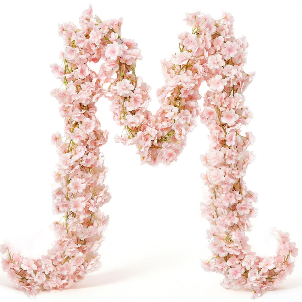 YRIOWMI cherry blossom garland creates a romantic arch backdrop for weddings.