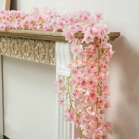 YRIOWMI dense petal garlands create lush, voluminous looks for photos.
