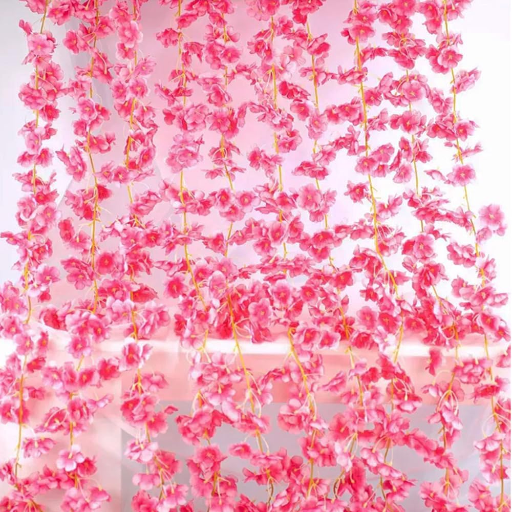 YRIOWMI wedding backdrop using cherry blossom garlands adds elegant ambiance.