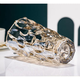 Yuccasly amber glass vase with flowers emphasizes natural centerpiece warmth
