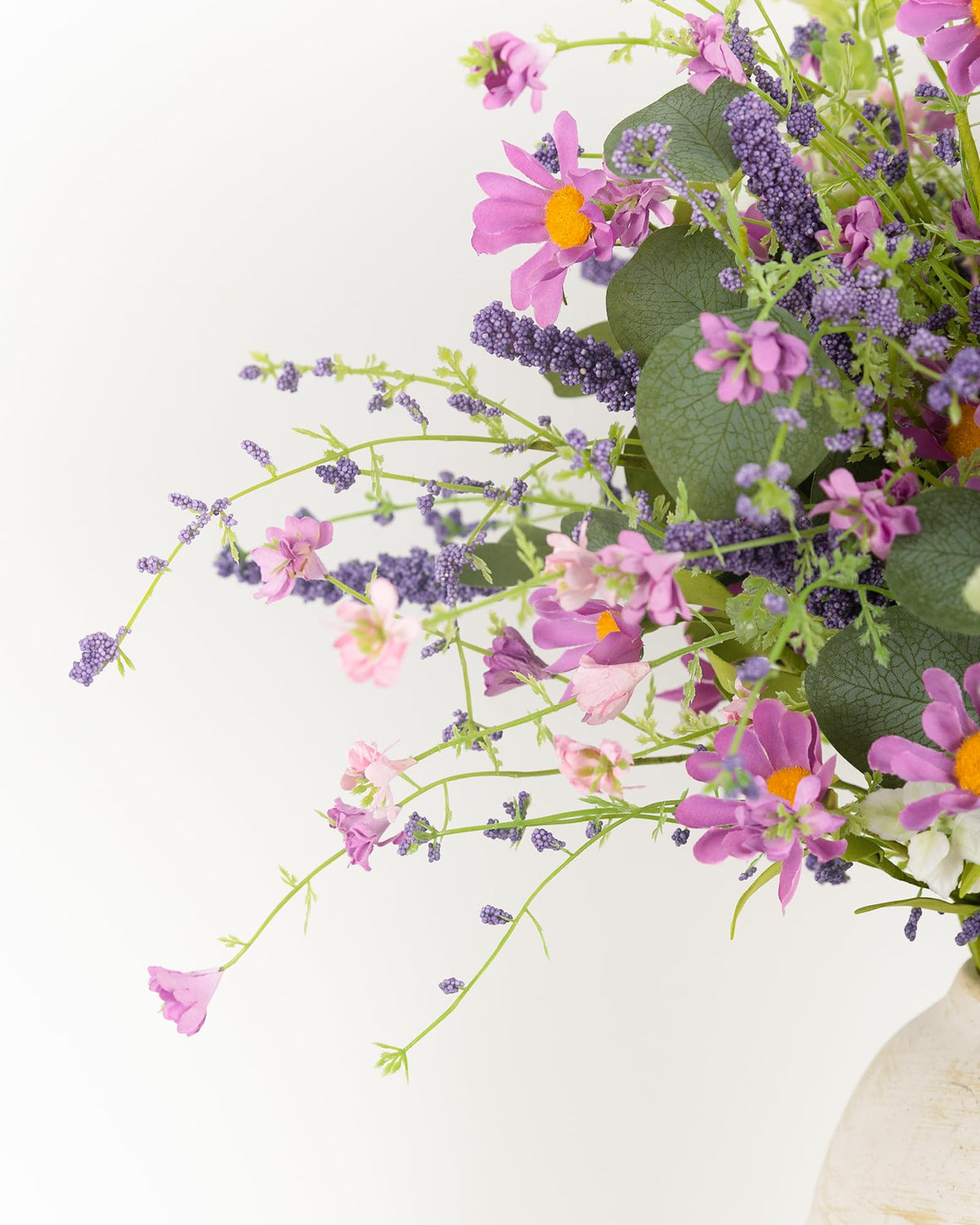 YUGALI no-shed artificial stems stay vibrant with zero watering and maintenance.