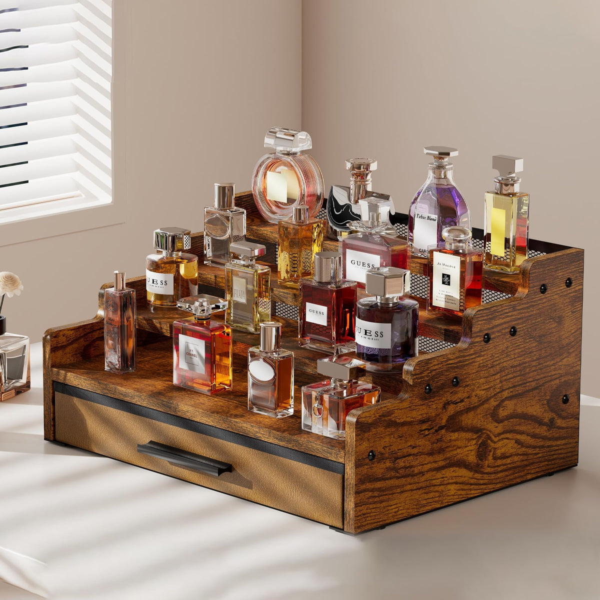 The Yuzehuaza 4-tier Cologne Organizer top shelf keeps perfumes easily accessible.