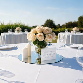 Yuzeyurun mirror tray highlighting floral arrangements and light.