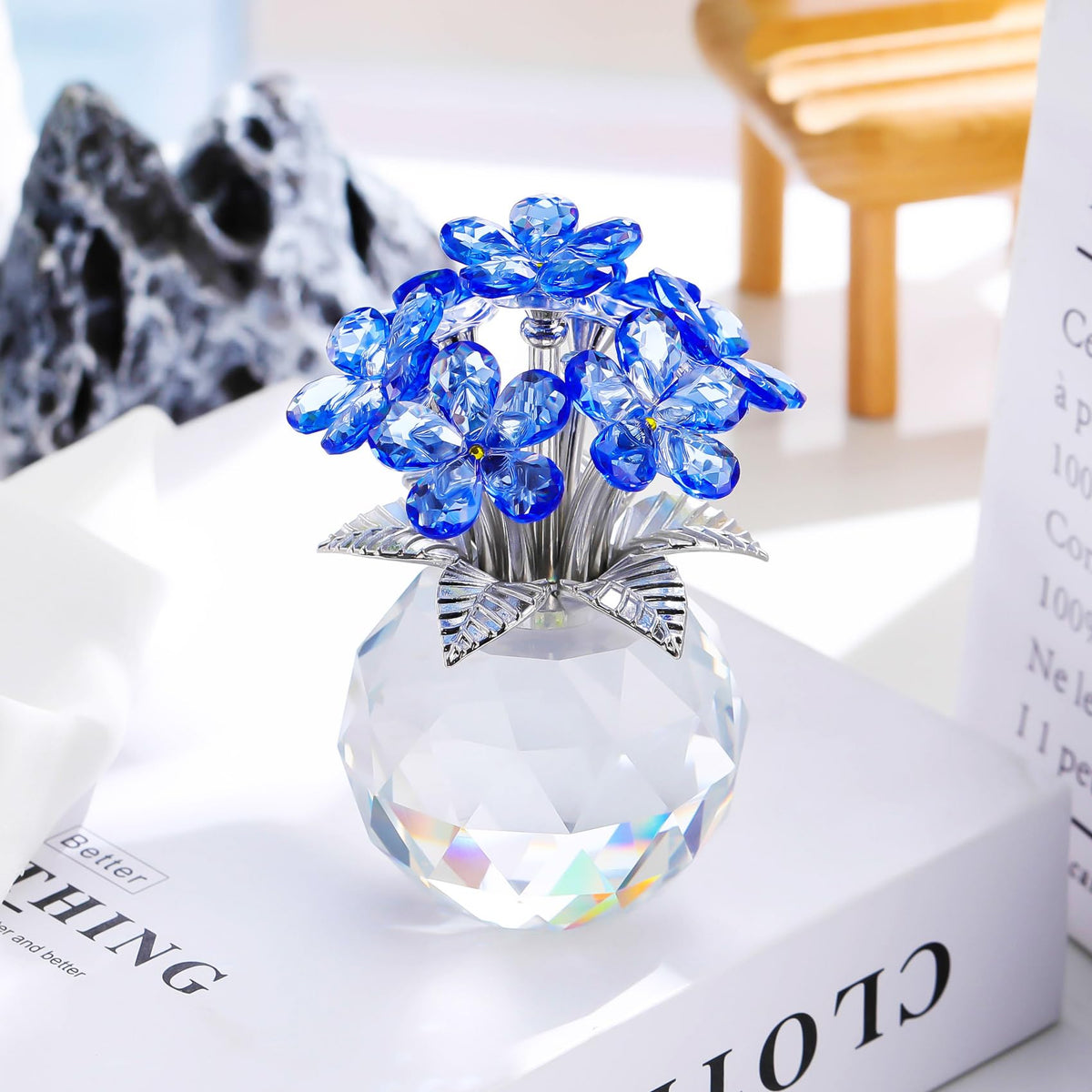 Crystal bloom reflecting light to enhance ambience on a tabletops