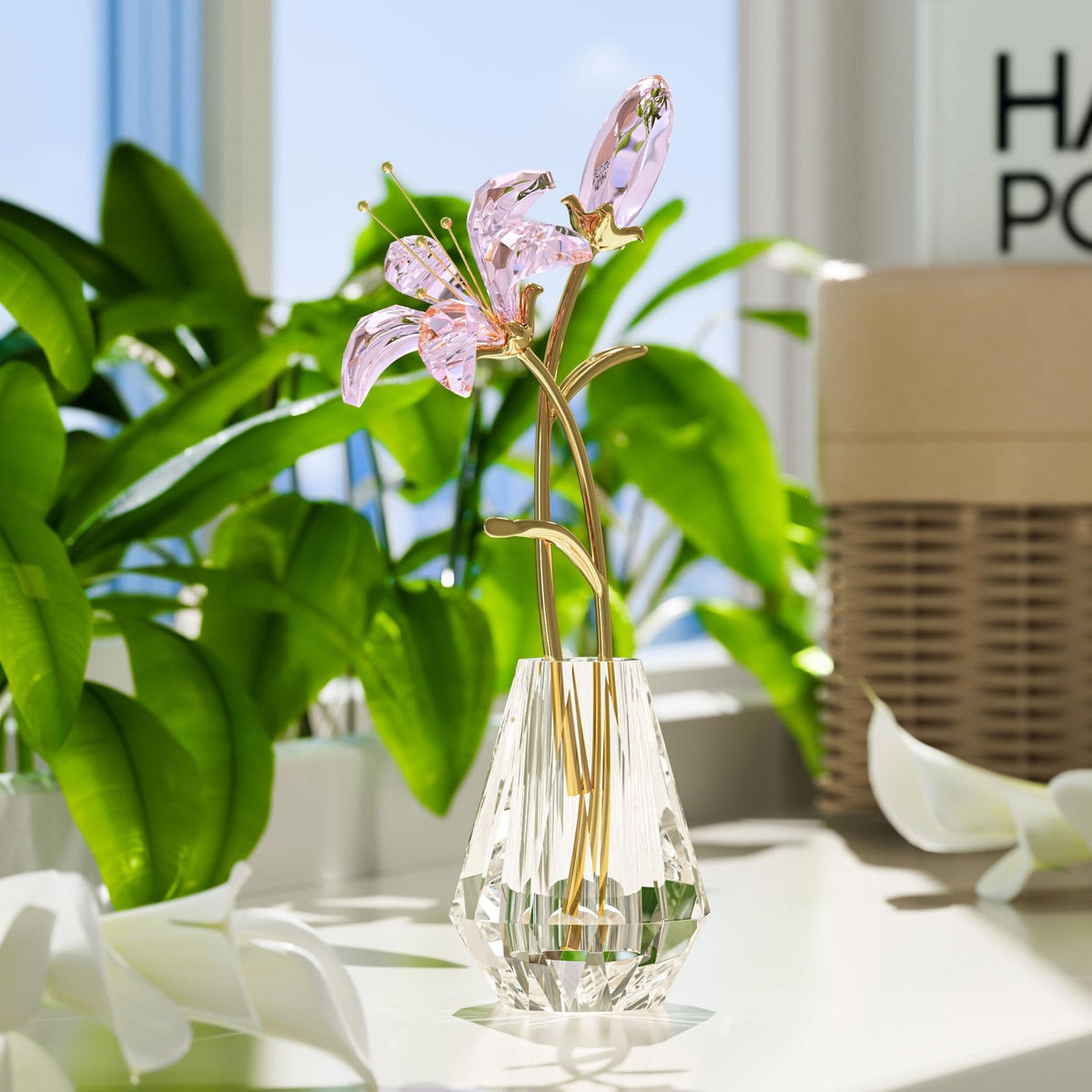 YWHL crystal lily vase collection displayed on shelf