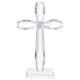 YWHL crystal standing cross on windowsill casting rainbow light