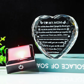 YWHL close-up of laser-engraved inscriptions inside the crystal