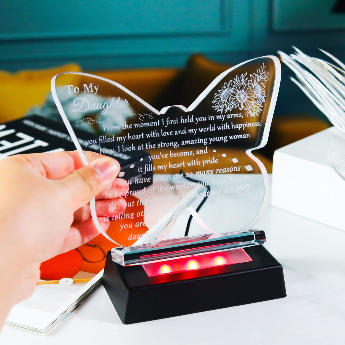 YWHL night-light mode casting a gentle glow on the keepsake
