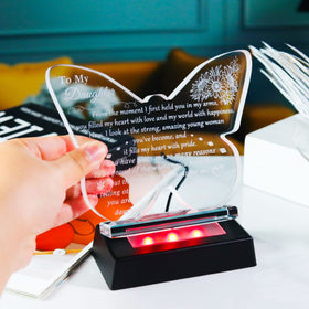 YWHL night-light mode casting a gentle glow on the keepsake