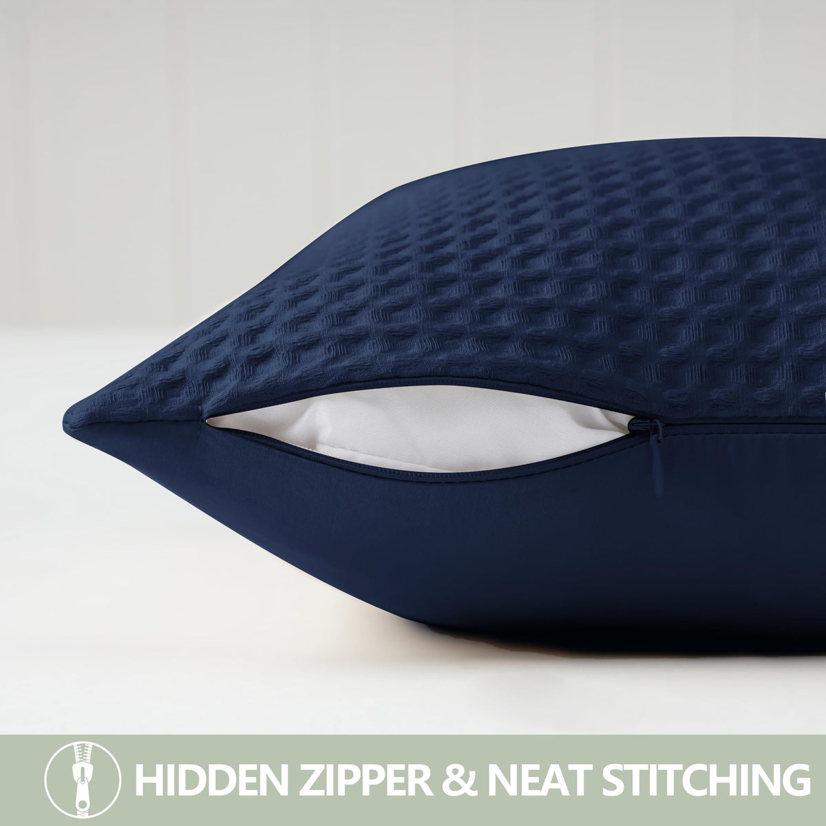 Zaizaihome pillow cover draped on a sofa in navy tones