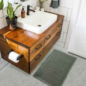 ZALL absorbent waffle mat dries feet quickly and protects cold tile.