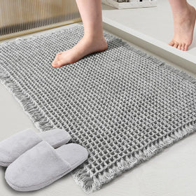 ZALL Grey Waffle Bath Mat closeup highlights durable weave and plush texture for quick drying.