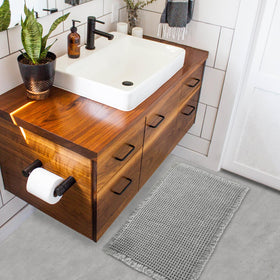 ZALL Non-slip backing keeps the mat stable on wet bathroom floors.