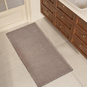 ZALL Tan Waffle Bath Mat is machine washable for easy cleaning