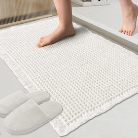 ZALL waffle bath mat shows absorbent texture for quick water pickup and dry floors.