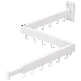 ZdwCyl tri-fold wall rack stowed against a wall, space-saving design.