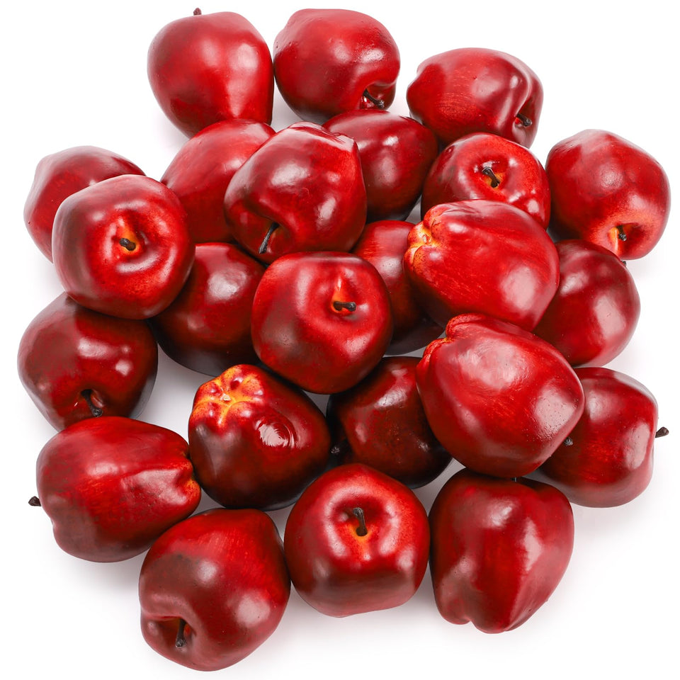ZEAYEA artificial apples 24-pack on kitchen counter for lifelike seasonal decor.