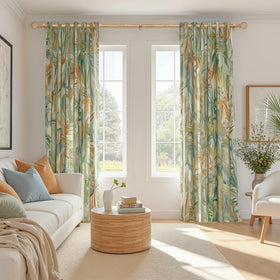 Leaf-pattern finials on the Zeerobee wood curtain rod add decorative detail