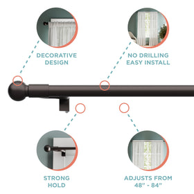 Zenna Home bronze finish with round finials adds modern decor touch.