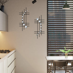 ZEXUIRU black-finish abstract metal art offers bold contrast