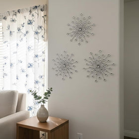 ZEXUIRU crystal rhinestones add sparkle to metal wall decor.