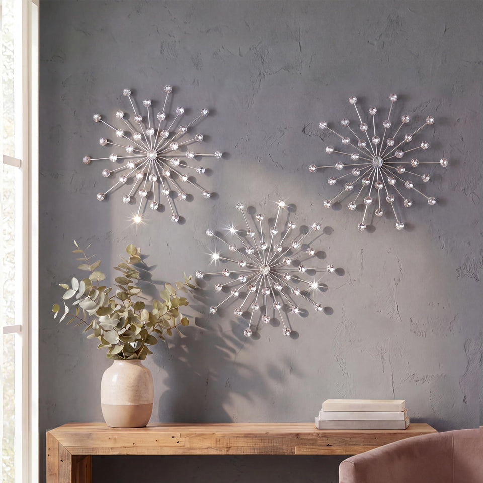 ZEXUIRU silver starburst wall art ensemble with crystal accents for a sparkling living room focal point.