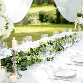 Zfaron eucalyptus garland with white flowers for wedding table decor.