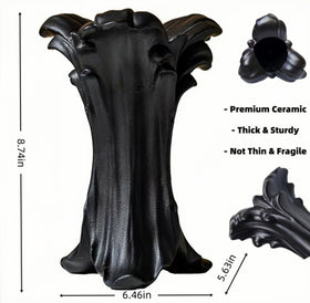 ZgdLScyF matte black vase enhances dark academia decor on dining tables.