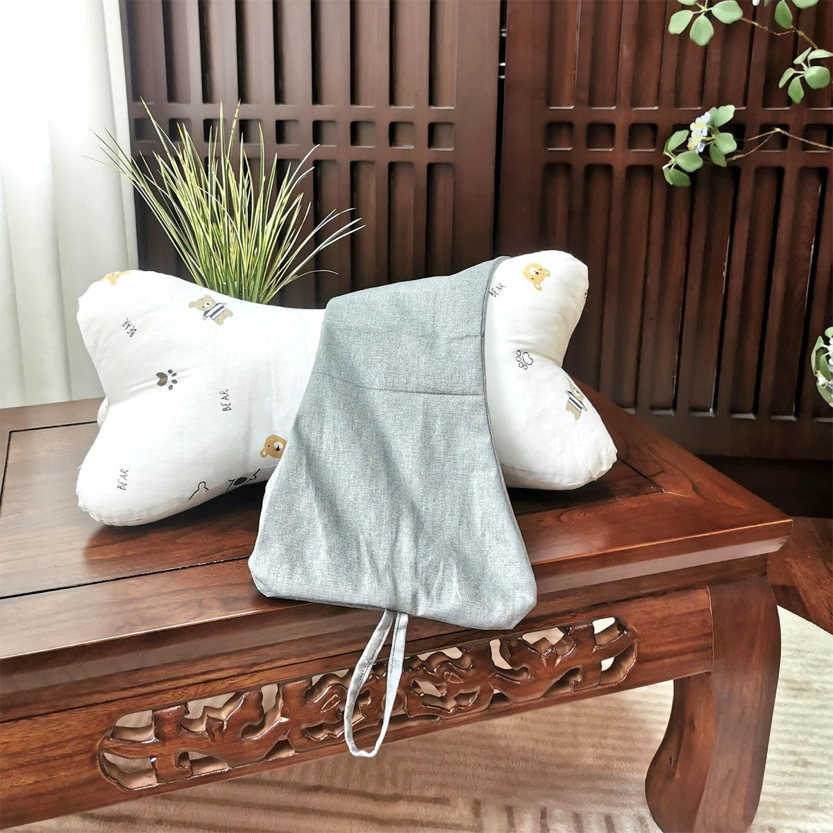ZHIWEIKJ neck bone pillow end loops for secure attachment.