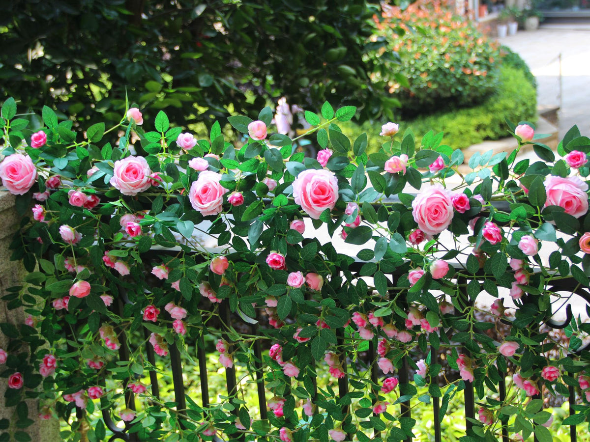 Zhixinyue artificial rose vine for wedding arbors in pink.