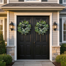 Zhoree eucalyptus wreath decorating kitchen or dining area with natural tones.