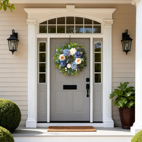 Zhoree indoor-outdoor wreath in blue hydrangea and white peonies for versatile display
