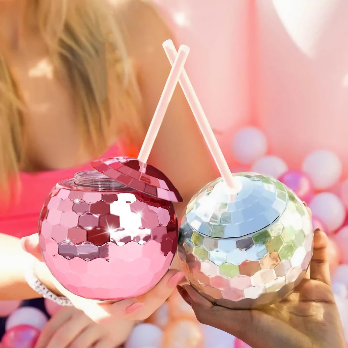 Zhuruinin disco ball cups at a nightclub or bar display setting.