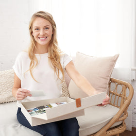 ZICOTO linen storage boxes protect photos from dust with flip lids.