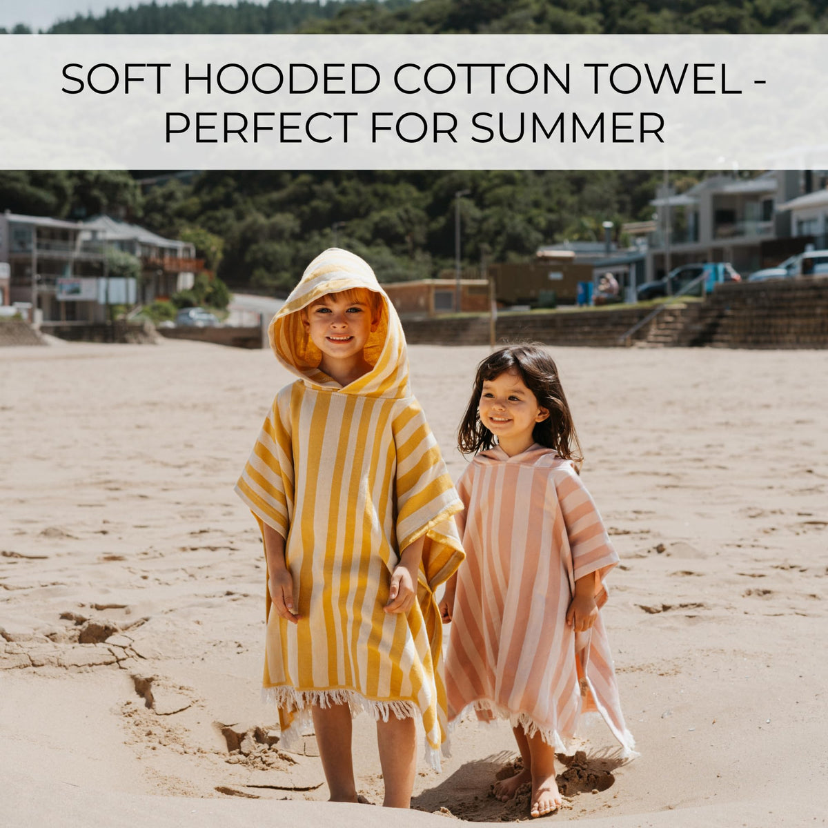 ZICOTO poncho-style hooded towel worn after swimming for easy warmth.