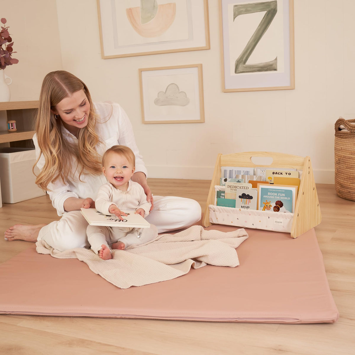 ZICOTO portable kids bookshelf at kid height promotes independent grabbing of favorites.