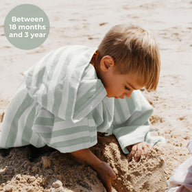 ZICOTO toddler bath or pool moment with wrap-ready towel.