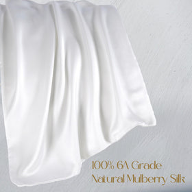 Close-up of ZIMASILK silk texture shows smooth, breathable fabric.