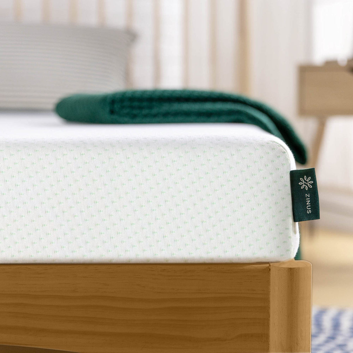 Zinus mattress in bunk or trundle setup for space saving.
