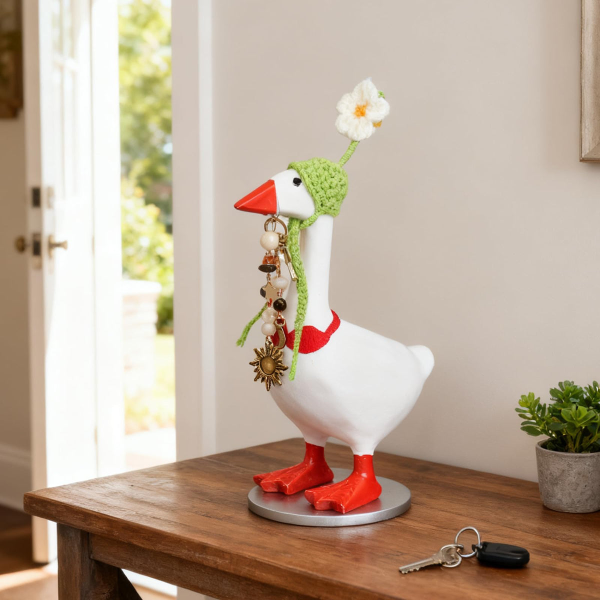 ZioNNyxviana knit hat outfit on desk mini goose key holder enhances seasonal style