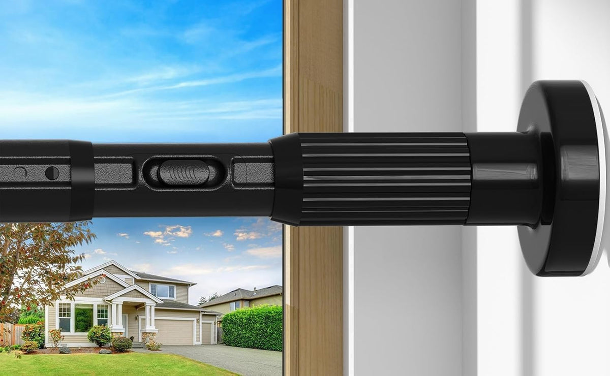 ZipGlo black tension rod in a window for no-drill, renter-friendly setup.